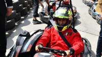 وزير الشباب والرياضة يقود سيارة كارتينج ويكرم طفل مصري 