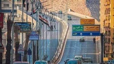 محور أنور السادات وطلة مميزة على الأهرامات