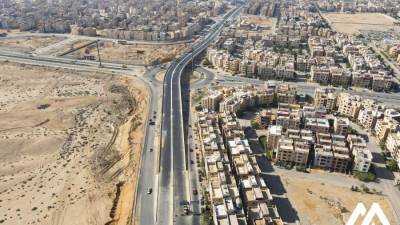 بالصور.. الانتهاء من كوبري تقاطع محور جمال عبدالناصر وشارع الجزيرة بالتجمع
